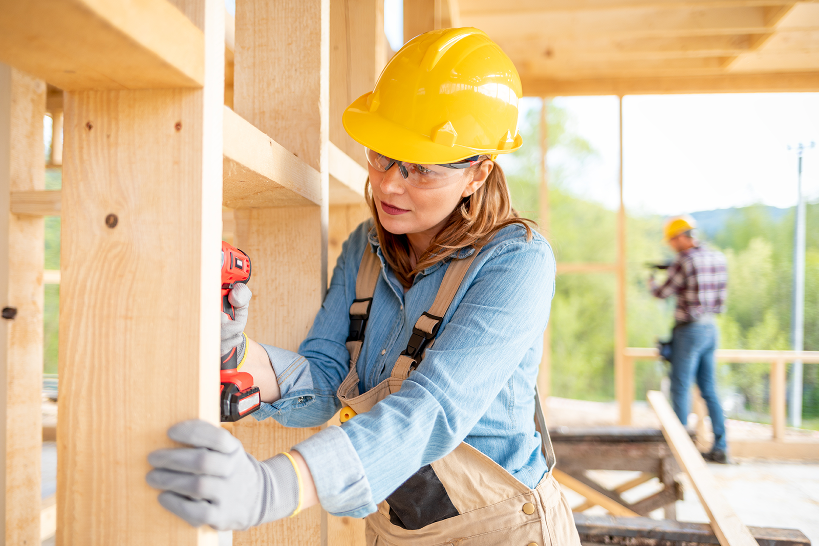 Woman in Construction Woman in hard hat doing construction